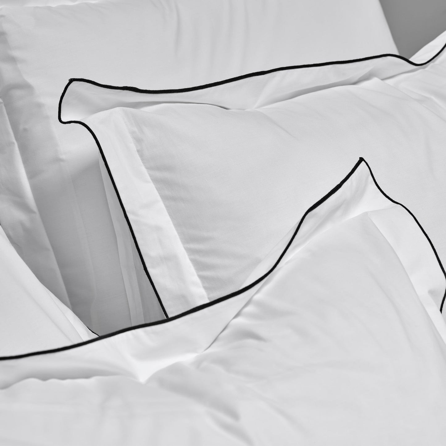 Rolinho negro Almohada